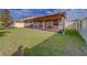 Spacious lawn and patio for outdoor living at 15430 Long Cypress Dr, Ruskin, FL 33573