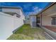 Home exterior with well-manicured lawn at 15430 Long Cypress Dr, Ruskin, FL 33573