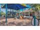 A community playground offers a safe and fun place for children to play at 15430 Long Cypress Dr, Ruskin, FL 33573