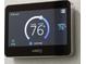 A Lennox thermostat on the wall reads 76 degrees and 55% humidity at 16431 Penn State Rd, Weeki Wachee, FL 34614