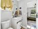 Charming bathroom featuring a white vanity with a stylish mirror and modern fixtures at 201 Gornto Lake Rd, Brandon, FL 33510