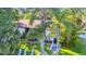 Charming home surrounded by palm trees and lush green landscaping at 201 Gornto Lake Rd, Brandon, FL 33510