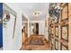 Open foyer with decorative rug and views into other rooms, showcasing the home's layout at 201 Gornto Lake Rd, Brandon, FL 33510