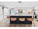 Open kitchen design with central island, counter seating, and natural light at 201 Gornto Lake Rd, Brandon, FL 33510