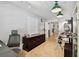 Home office with modern furniture, including a desk and a comfortable chair at 201 Gornto Lake Rd, Brandon, FL 33510