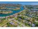 Stunning aerial view of a waterfront community with well-maintained homes, canals, and lush landscaping at 208 44Th Ne Ave, St Petersburg, FL 33703
