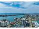 Stunning aerial view of the coastline, showing the interconnected waterways, beaches, and residential areas at 223 Island Way # 5D, Clearwater Beach, FL 33767