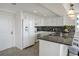 Well-equipped kitchen with ample storage and counter space, featuring modern appliances at 223 Island Way # 5D, Clearwater Beach, FL 33767