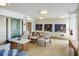 Inviting lobby area with comfortable seating, artistic decor, and sleek marble tables at 223 Island Way # 5D, Clearwater Beach, FL 33767