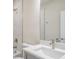 Elegant bathroom featuring modern fixtures, a large mirror, and a beautifully tiled shower and tub area at 2529 Mario Way, Clearwater, FL 33761