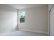 Neutral bedroom with carpet, closet, and window at 2529 Mario Way, Clearwater, FL 33761
