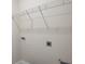 The laundry room has shelving for storage and convenient access to hookups at 2529 Mario Way, Clearwater, FL 33761