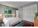 Comfortable bedroom featuring a large bed, ample closet space, and stylish décor at 2971 Estancia Blvd # 328, Clearwater, FL 33761