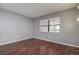 Clean bedroom with wood floors and natural light at 2971 Estancia Blvd # 328, Clearwater, FL 33761