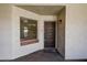 Inviting front entrance with a decorative door and a sidelight window allowing natural light to filter through at 2971 Estancia Blvd # 328, Clearwater, FL 33761