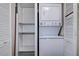 Convenient laundry area with a stacked washer and dryer unit, maximizing space efficiency at 2971 Estancia Blvd # 328, Clearwater, FL 33761