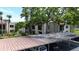 Covered parking in a community surrounded by trees, offering shade and protection for vehicles at 2971 Estancia Blvd # 328, Clearwater, FL 33761