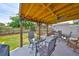 Inviting covered patio with outdoor seating area and ceiling fan at 3042 57Th N Ave, St Petersburg, FL 33714