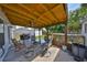 Inviting covered patio with outdoor seating area and ceiling fan at 3042 57Th N Ave, St Petersburg, FL 33714