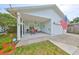 Charming single-story home with a welcoming front porch and well-maintained lawn, perfect for relaxing outdoors at 3042 57Th N Ave, St Petersburg, FL 33714