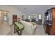 Comfortable living room featuring a fireplace, ample seating, and neutral decor, creating a cozy and inviting atmosphere at 3042 57Th N Ave, St Petersburg, FL 33714
