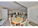 Bright open-concept living space connecting kitchen, dining, and living area with modern finishes and ample natural light at 3042 57Th N Ave, St Petersburg, FL 33714