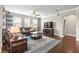 Spacious living room with hardwood floors and lots of natural light at 3204 Mapleridge Dr, Lutz, FL 33558