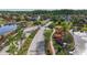 Beautiful community featuring lush landscaping, peaceful ponds, and well-maintained streets at 3204 Mapleridge Dr, Lutz, FL 33558