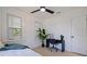 Bright bedroom space with desk setup, complemented by natural light and an airy atmosphere at 3230 Queensboro S Ave, St Petersburg, FL 33712
