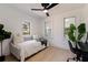 Cozy bedroom features a daybed and desk, ideal for work or relaxation with bright natural light at 3230 Queensboro S Ave, St Petersburg, FL 33712
