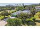 Aerial view of the property showcasing the home's lush landscaping, and neighborhood at 3351 San Jose St, Clearwater, FL 33759