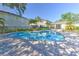 Community pool with inviting blue water and ample lounging space at 3456 High Hampton Cir, Tampa, FL 33610