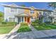Charming townhomes featuring colorful exteriors and well-maintained landscaping at 3456 High Hampton Cir, Tampa, FL 33610