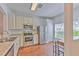 Well-lit kitchen with stainless steel appliances and a cozy breakfast nook at 3456 High Hampton Cir, Tampa, FL 33610