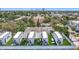 Stunning aerial view of rooftop decks, landscaping, and city skyline in the background at 4215 W North A St # 3, Tampa, FL 33609