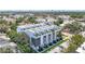 High angle of modern townhomes showcasing rooftop decks and well-manicured landscaping at 4215 W North A St # 3, Tampa, FL 33609