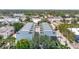 An aerial view of modern townhomes featuring rooftop decks, showcasing stylish urban living with neighborhood views at 4215 W North A St # 3, Tampa, FL 33609