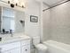 Contemporary bathroom with stone tile, modern vanity and sink, and a separate shower area at 4215 W North A St # 3, Tampa, FL 33609