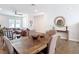 Dining area open to living room with hardwood floors, modern decor, and lots of light at 4215 W North A St # 3, Tampa, FL 33609