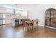 Modern kitchen with stainless steel appliances, island seating, and an adjacent dining area at 4215 W North A St # 3, Tampa, FL 33609