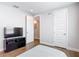 Spacious living room featuring hardwood floors, neutral walls, and modern fixtures at 4215 W North A St # 3, Tampa, FL 33609