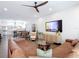 Inviting living room with modern furniture, a large television, and an open layout into the kitchen at 4215 W North A St # 3, Tampa, FL 33609