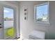 Bright living space features door to outdoor space with artificial turf at 4215 W North A St # 3, Tampa, FL 33609