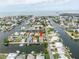 Stunning aerial view of waterfront property with access to canal and beautiful views at 4396 5Th Isle Dr, Hernando Beach, FL 34607