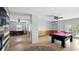This game room features a billiard table and foosball table, with a modern color scheme at 4396 5Th Isle Dr, Hernando Beach, FL 34607