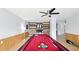 This game room has a billiard table, flat screen TV, and an electric fireplace at 4396 5Th Isle Dr, Hernando Beach, FL 34607