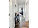 Hallway featuring hardwood floors and a console table at 4396 5Th Isle Dr, Hernando Beach, FL 34607
