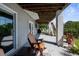 Relaxing covered patio with a view, perfect for outdoor seating and enjoying the fresh air at 4396 5Th Isle Dr, Hernando Beach, FL 34607