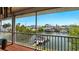 Scenic water view from the screened patio, showcasing boats docked along the canal at 4396 5Th Isle Dr, Hernando Beach, FL 34607