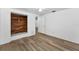 Bright bedroom features hardwood flooring, closet with wooden detail, and ceiling fan at 4920 Zodiac Ave, Holiday, FL 34690